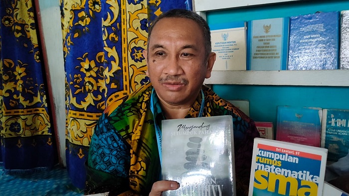 FOTO : Kepala Dinas Perpustakaan dan Kearsipan (DPK) Kaltim HM Syafranuddin.